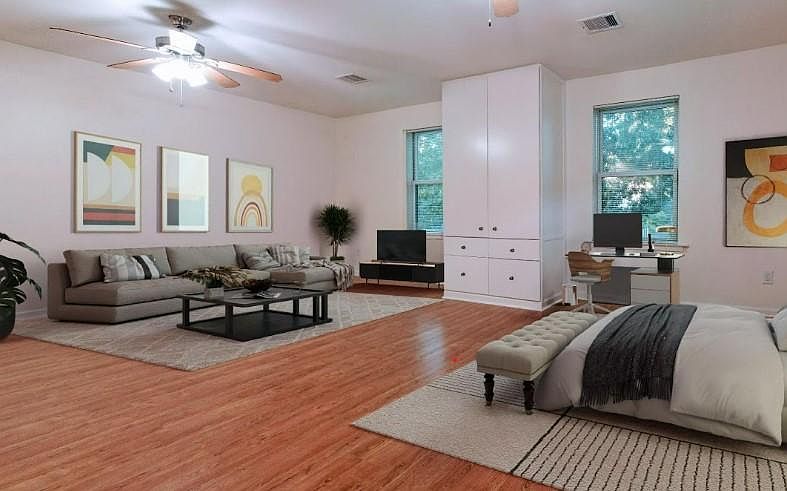 View looking towards windows flooding space with plenty of natural light.