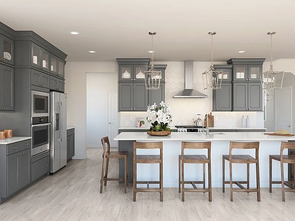 Kitchen with center island and pendant lighting