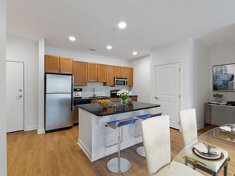 Our chef-inspired kitchens feature designer finishes and stainless steel appliances