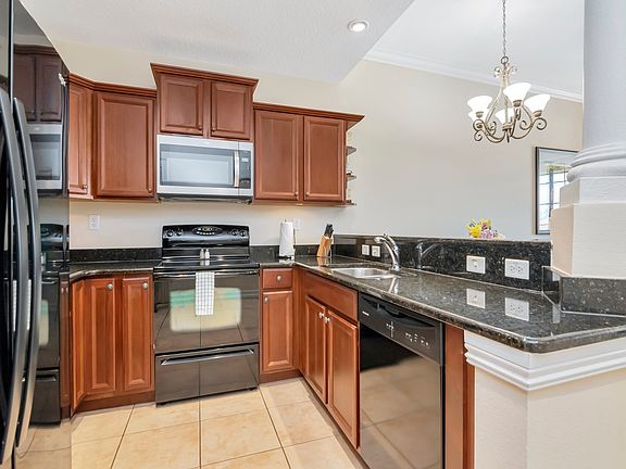 2nd image of 13941 Clubhouse Dr #313