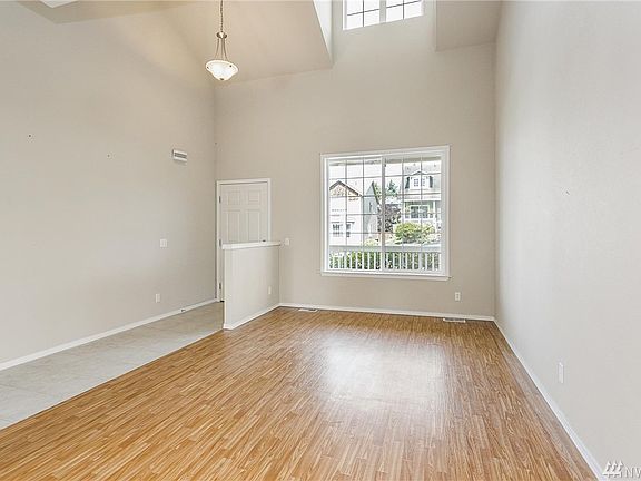 Living area has vaulted ceilings. 