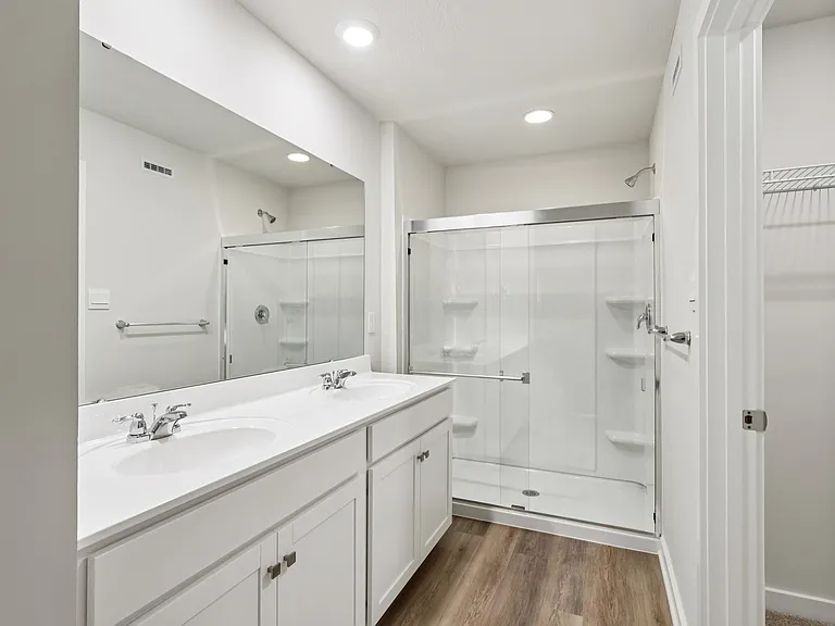 Master Bedroom - Ensuite bathroom with dual vanity, stand in shower and walk in closet