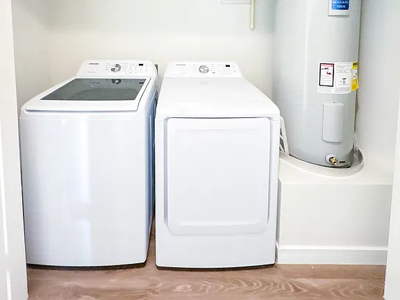 In-home laundry area — representative home at Deer Valley 24.