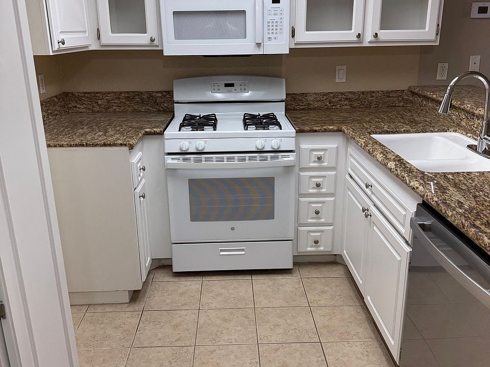 kitchen with newer dishwasher and updated kitchen