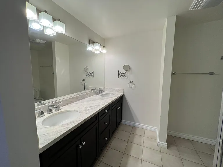 Dual sinks in master bathroom.