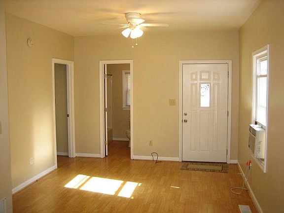 Den, Laminate Wood Floor throughout Home