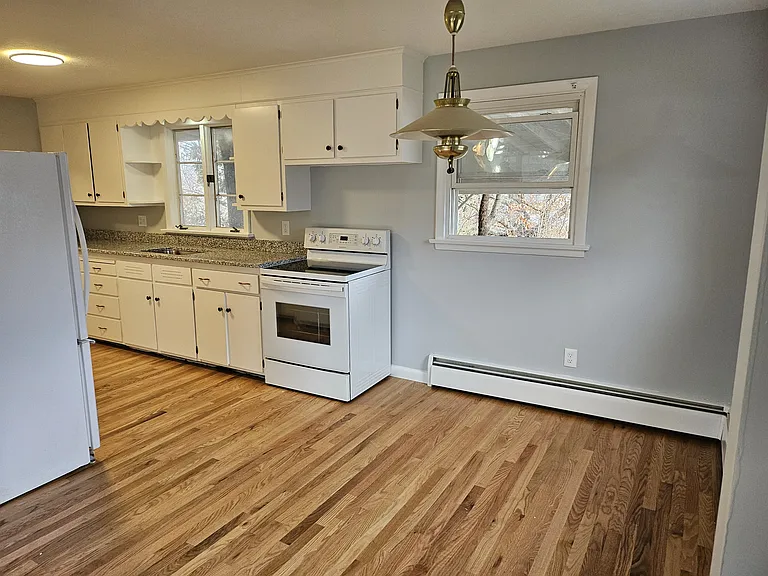 Lots of freshly painted cabinets