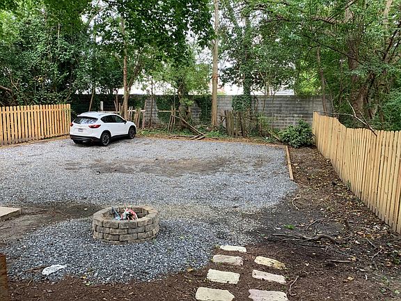 Off street parking in rear of duplex for 4 cars.