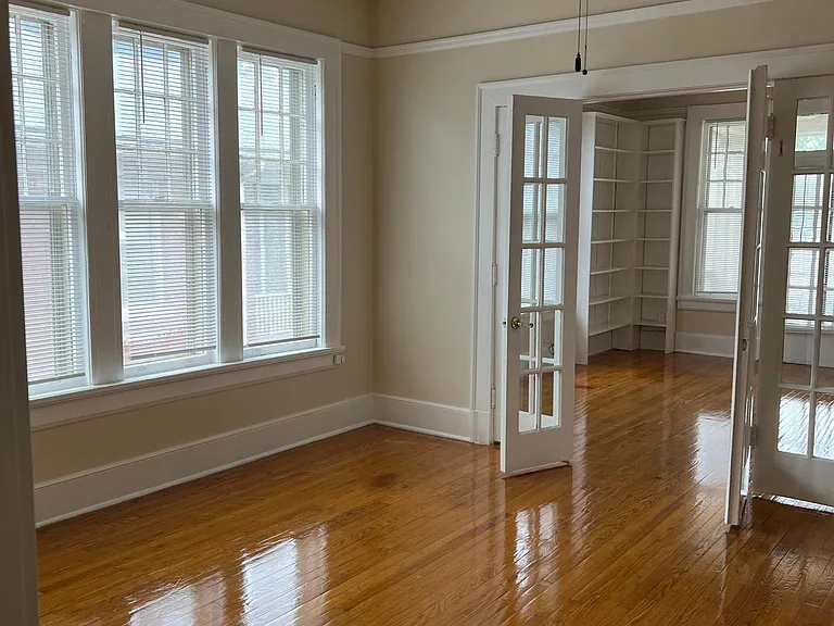 Large Den with french doors entering into office or potential 3rd bedroom