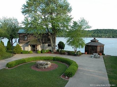 Time to Relax and Enjoy.  Horseshoe drive, double lot, incredible vistas, RV hook-up for guests, 16' Amish-Built and screened gazebo.  Absolutely Awesome setting!
