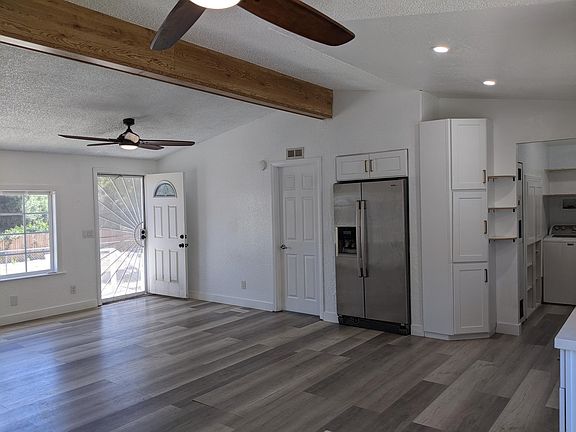 view from dining area into living area