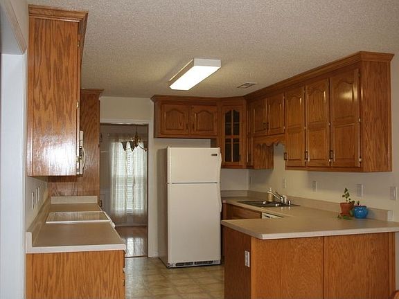 Kitchen w/Lots of Oak Cabinets