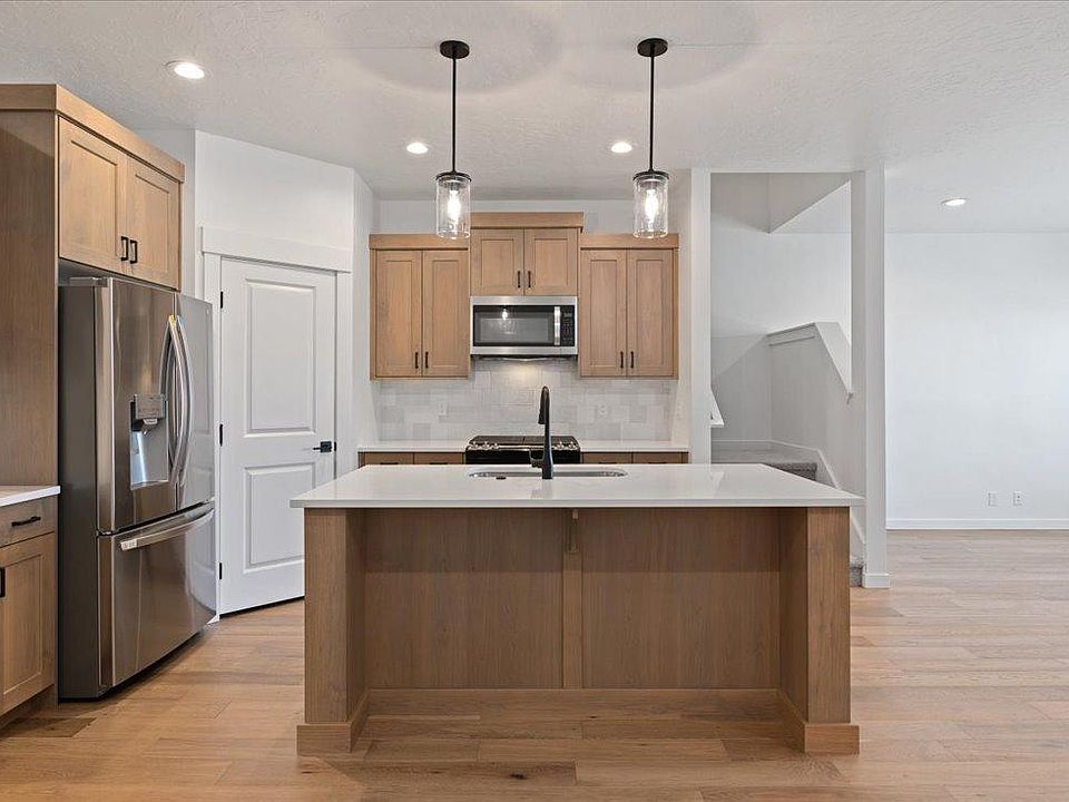 The kitchen with cabinets and all new cabinets and appliances.