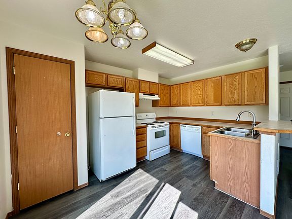 Kitchen with all appliances included, pantry for storage.