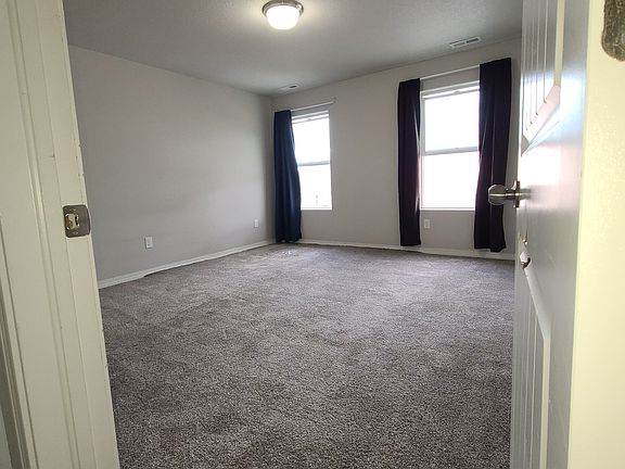 Looking into the large primary bedroom