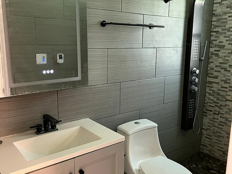 Relax in your private retreat featuring a spa-like bath with heated floors and a luxury walk-in shower.