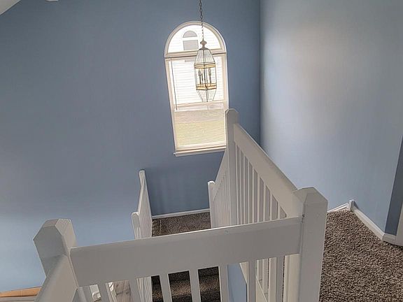 Beautiful chandelier on stairway