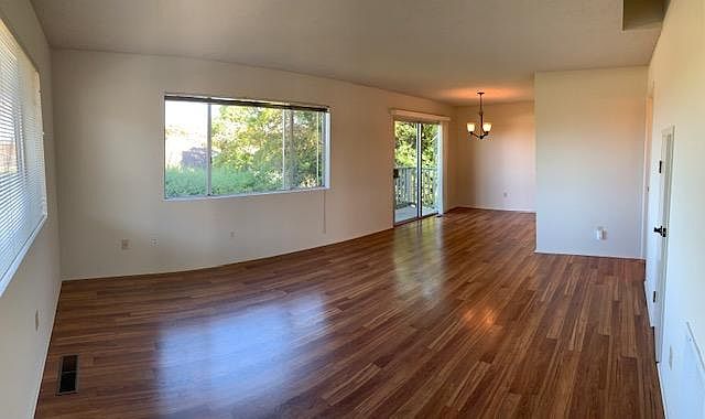 Living room, facing dining room.