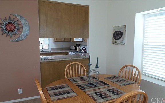 Dining area with pass-through to kitchen.