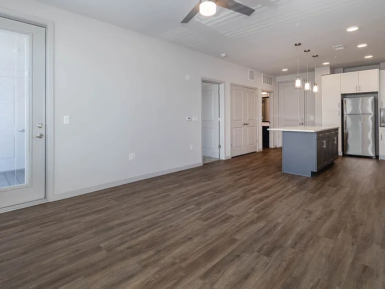 Living Room with Balcony and Hard Surface Flooring