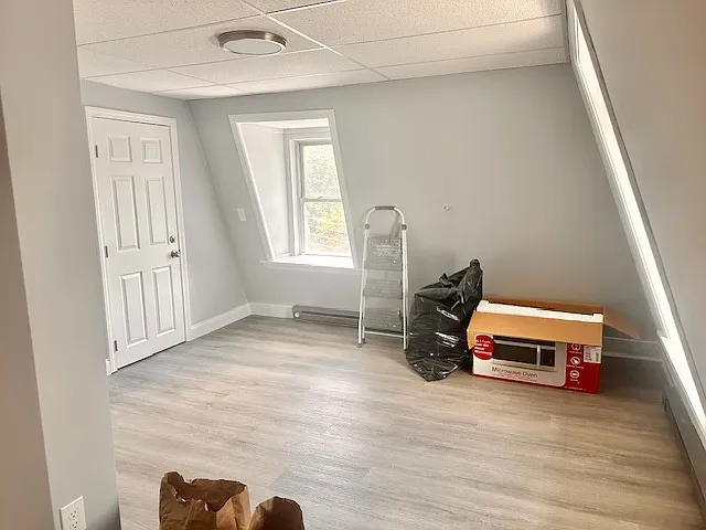 bedroom area with entrance door.