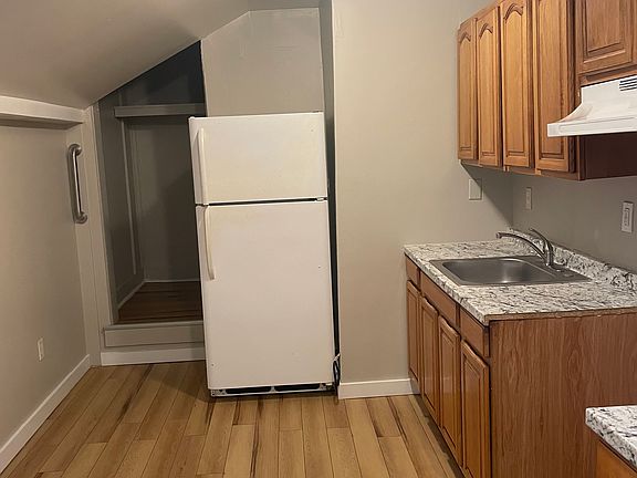 Kitchen w/ large pantry ( missing new stove from photo)