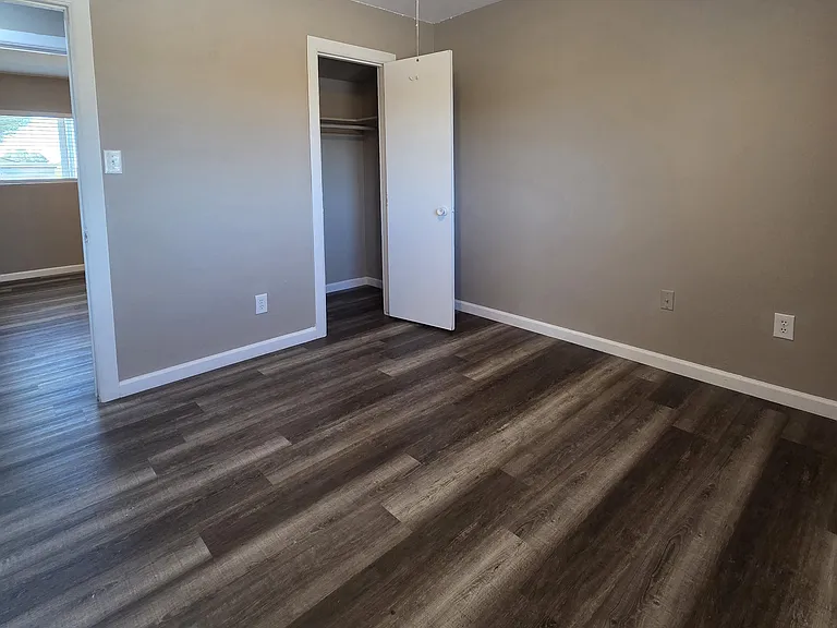 Bedroom #3 with lighted ceiling fan