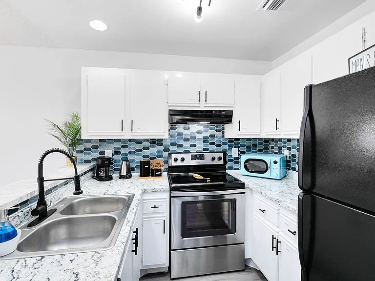 Oasis - 3165 South St. — Photo 51