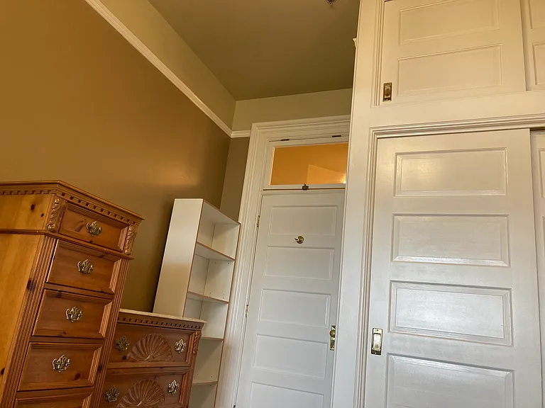 Storage area above closet
