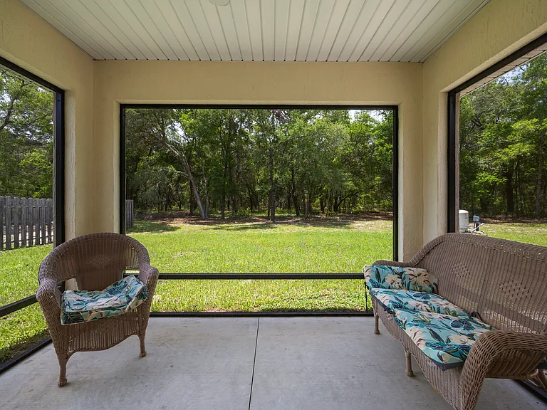 UNFURNISHED SCREEN BACK PATIO