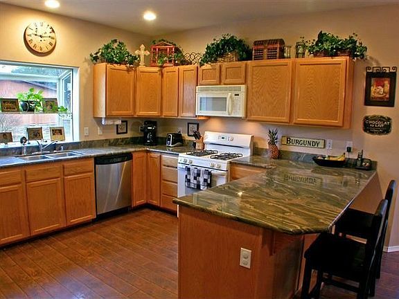 Kitchen w/slab granite countertops