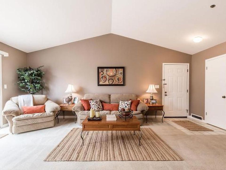 Vaulted ceilings of top, corner condo