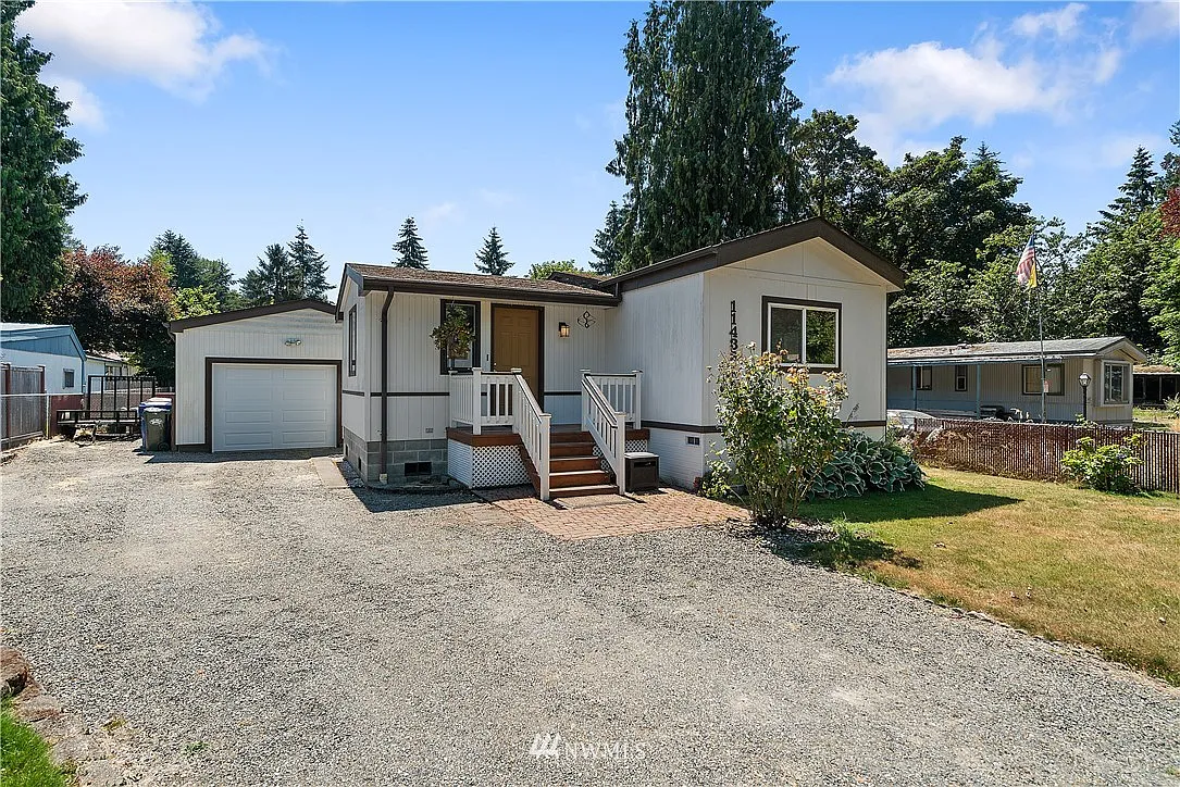 11433 Riverside Drive SE photo 1