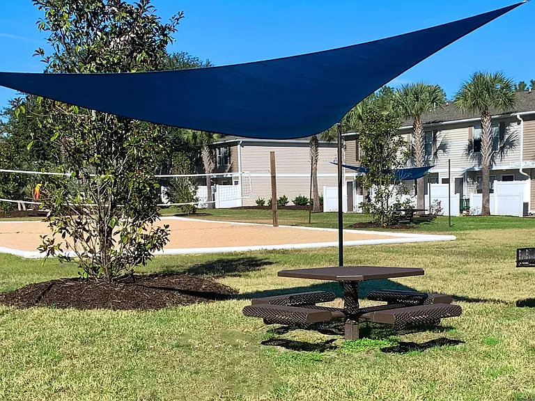Revel in a cookout at our designated picnic area, next to the volleyball court, complete with a charcoal grill for outdoor dining bliss.