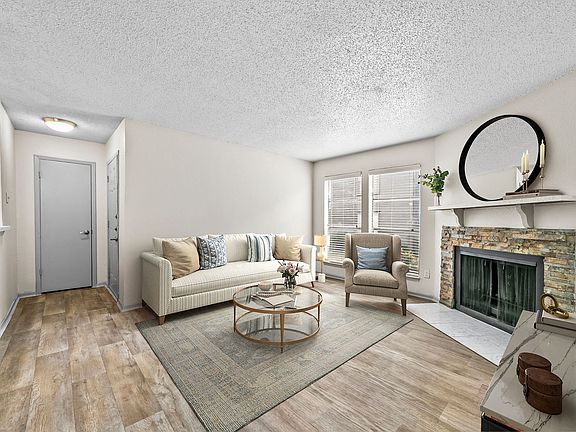 B1 Living Room with Wood-burning Fireplace