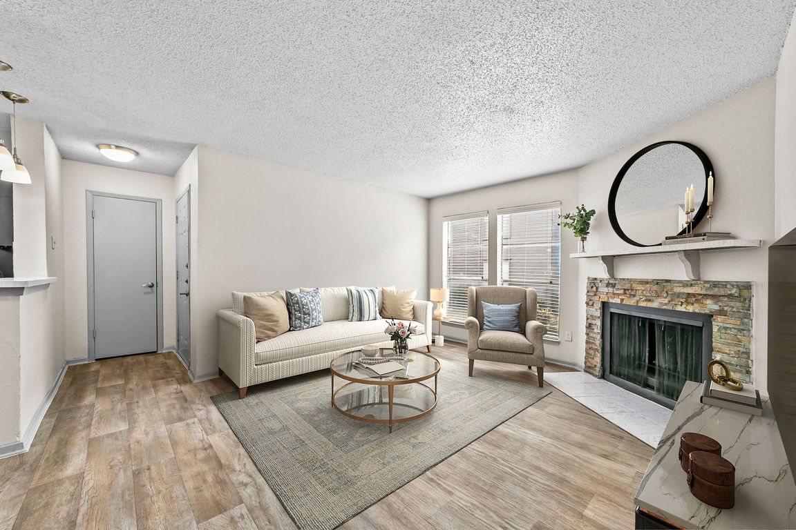 B1 Living Room with Wood-burning Fireplace