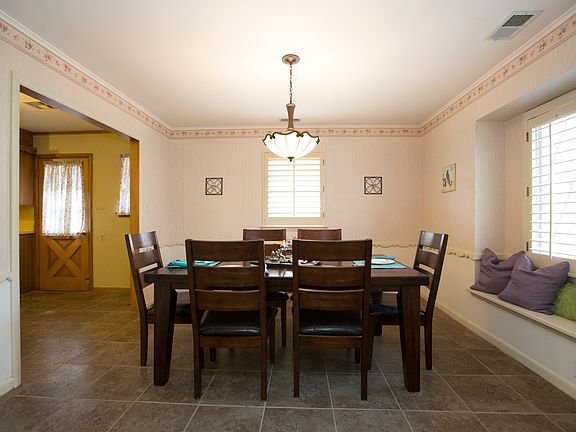 Formal Dining with Tile Flooring