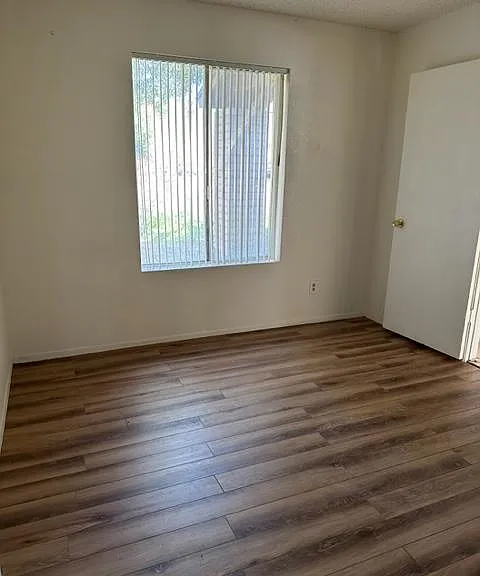 Front bedroom
1 Opens to living room
Does not show new paint or ceilings redone.