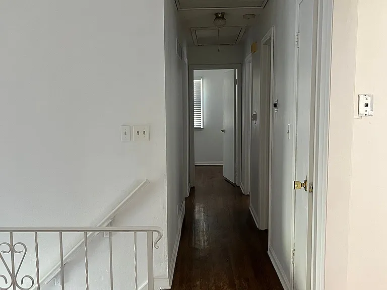 Hallway to three bedrooms