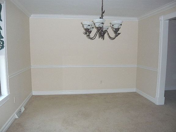 Dining Room with New Chandelier and Moldings