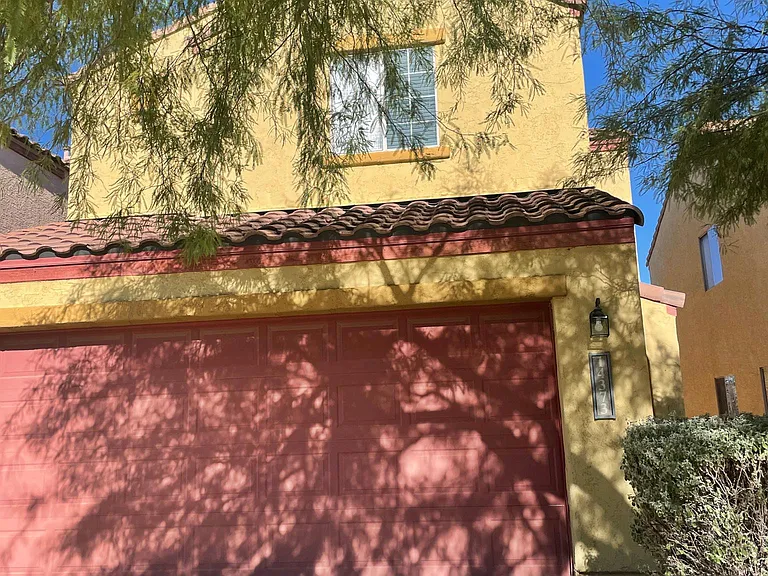 2 stories, 2 car garage and driveway parking