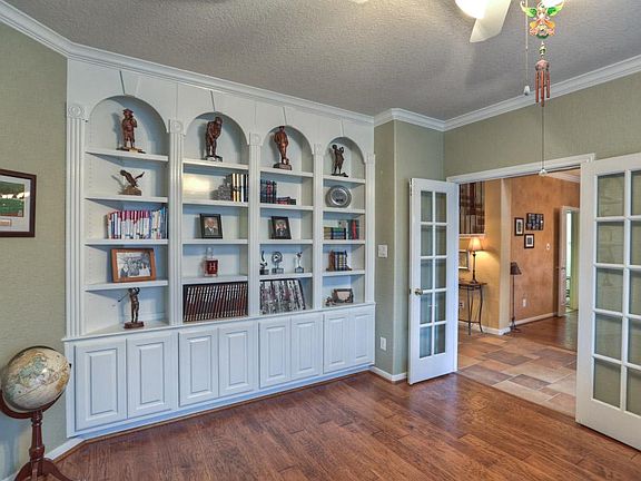 Study with built-ins and crown molding.