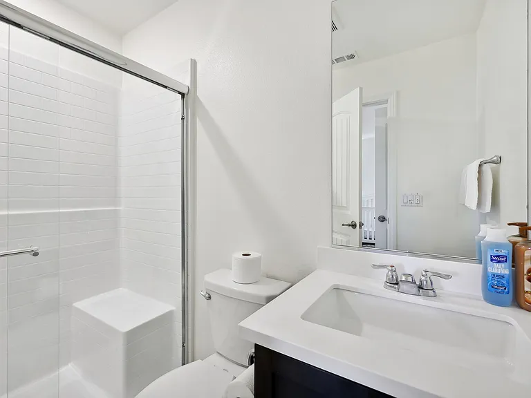 All-inclusive bliss: a full bathroom that makes every moment feel indulgent.