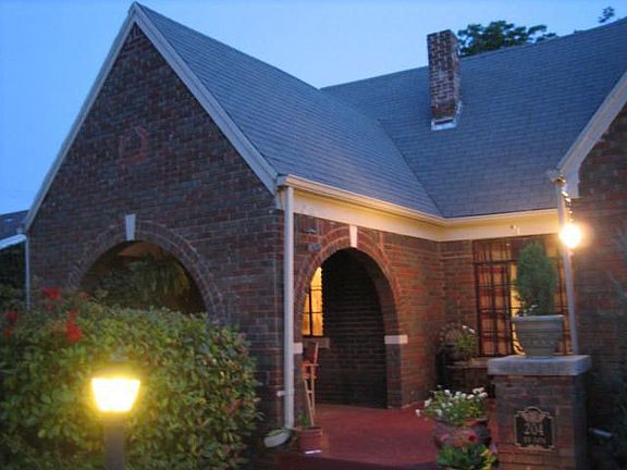 Covered front porch where we eat and entertain