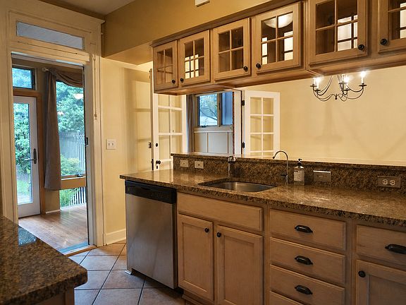 Kitchen bar, with view of dining room and eat-in porch area