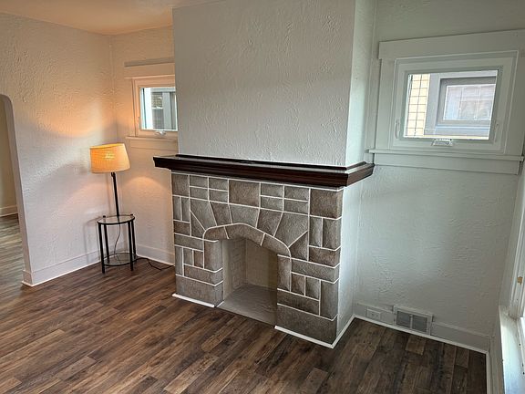 The beautiful decorative fire place makes the living room feel like home!