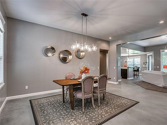 Open concept layout with formal dining over-looking the living area!