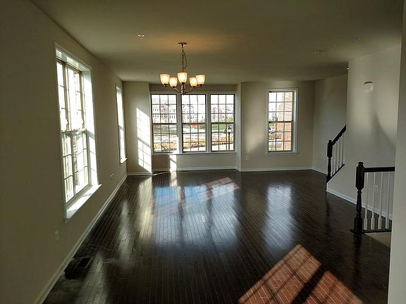 Open concept living and dining room, new hardwood floors