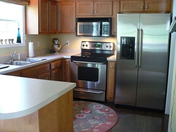 Bright kitchen with stainless steel appliances