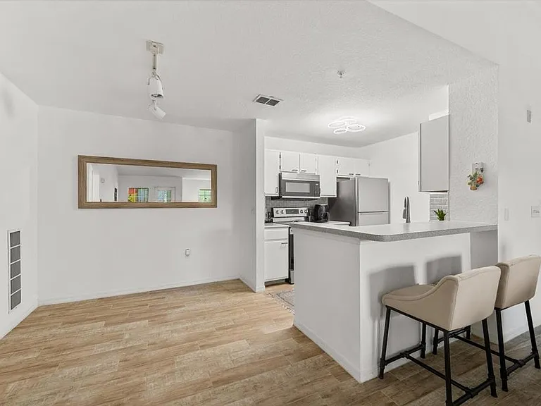 8933 Manor Loop #204 — Photo 14